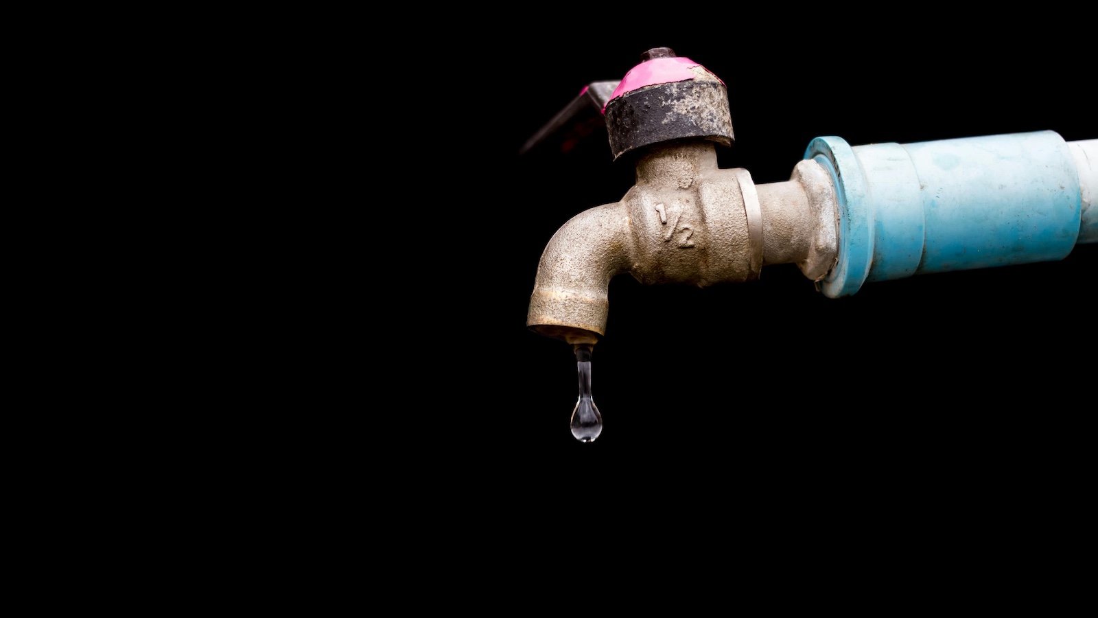 Close Up Photo of Tap Faucet